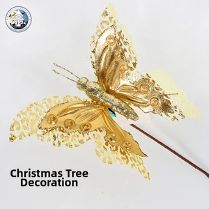Detailed view of a gold glitter butterfly Christmas tree ornament with hollow mesh wings