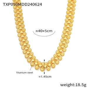 Detail view of gold titanium steel layered disc necklace with size measurements