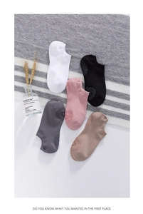 Detail showing five pairs of bamboo fiber yoga socks with non-slip silicone dot patterns
