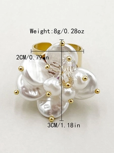 Detail view of gold flower ring with pearls and crystals including 3cm size dimensions