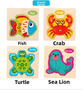 Set of four wooden ocean animal puzzles featuring fish, crab, turtle and sea lion for kids