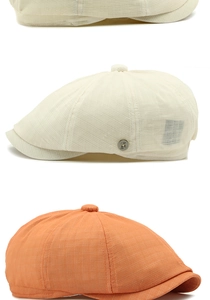 Detail of breathable mesh texture and metal logo buckle on summer newsboy caps