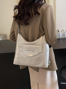 Silver versatile backpack tote with a chic bow and large capacity for women