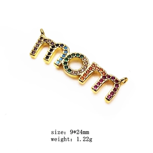 Macro detail of MOM letter pendant with colorful cubic zirconia and dimensions