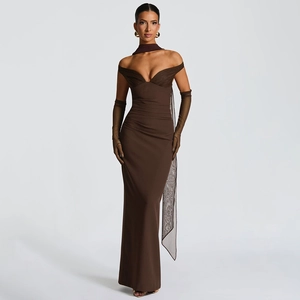 Detail view of brown tube dress with matching long gloves and sheer scarf accessory