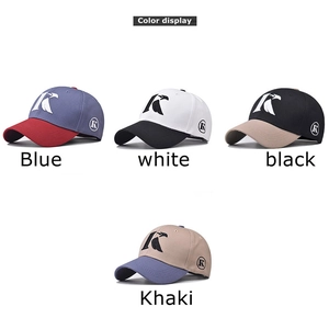 Cotton baseball caps with K letter embroidery in multi-color options on white background