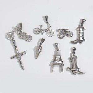 Variety of silver stainless steel charms including motorcycle, bike, cross and boots