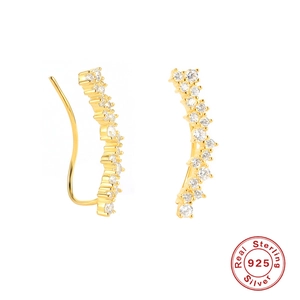 Detailed view of S925 sterling silver curved gold earrings with white zircon stones