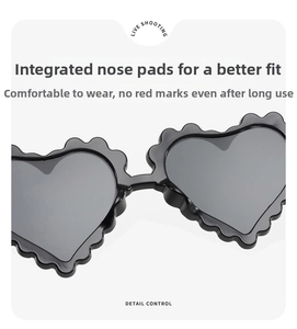Detailed macro view of heart sunglasses featuring comfortable integrated nose pads