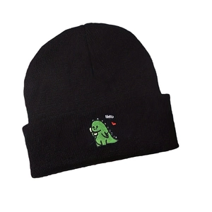 Black knitted beanie hat with a green cartoon dinosaur embroidery and Hello lettering