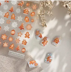 Adesivi per nail art natalizi dettagliati con omino di pan di zenzero e motivi a rilievo