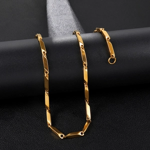 Close-up of gold-plated stainless steel melon seed chain necklace with lobster clasp