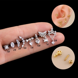 Assorted silver heart and spider web cartilage stud earrings with cubic zirconia