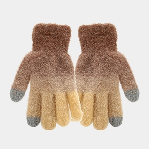 Detail of gradient knit gloves with touchscreen-compatible fingertips in brown and beige