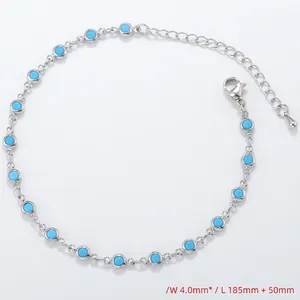 Macro shot of silver chain anklet with 4mm blue stones and 50mm adjustable extension chain
