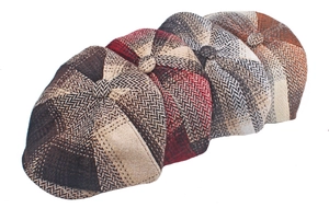 Detail of multi-color herringbone and houndstooth patterns on vintage wool newsboy caps