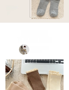 Close-up of vintage vertical rib knit socks with elegant lace trim in warm earth tones