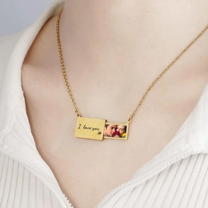 Golden sliding locket necklace with I love you engraving and custom photo compartment