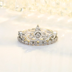 Elegant crown wedding ring for couples featuring shimmering crystals in silver finish