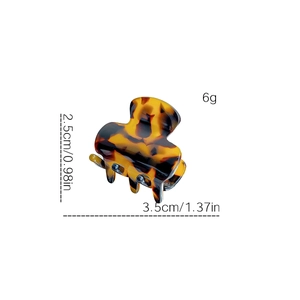 Small tortoiseshell acetate hair claw clip for bangs measuring 3.5cm by 2.5cm