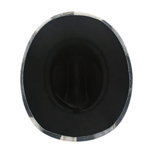 Detail view of the vintage plaid brim and black fabric lining of this western jazz hat