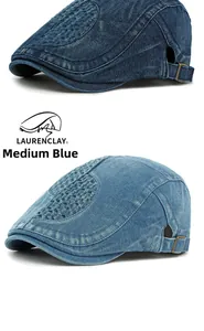 Detail of washed denim baseball cap with woven texture and adjustable metal buckle