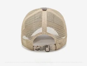 Close-up of khaki mesh back and digital camo adjustable strap with metal buckle