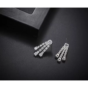 Elegant silver tassel earrings with round cubic zirconia and triple layered crystal drops