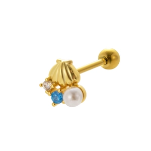 Detailed shot of golden shell earring with pearl and blue cubic zirconia accents