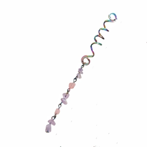 Close-up of rainbow spiral hair coil with natural purple stone pendant for braids
