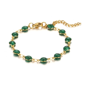 Bohemian gold stainless steel bracelet with green glitter charms and lobster clasp