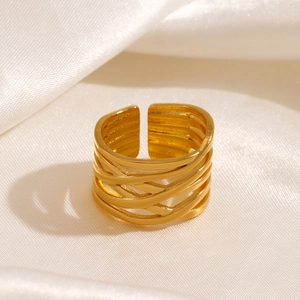 Golden multi-layer layered crisscross ring in 18K gold plated stainless steel on silk