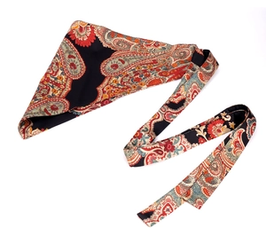 Detail of bohemian paisley print silk scarf belt in multi-color patchwork style