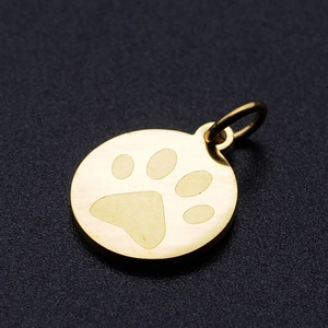 Polished gold stainless steel round charm with animal paw print and sturdy top loop