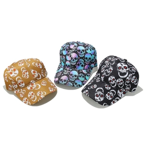 Three-pack vintage punk skull baseball caps in brown, black, and iridescent colors