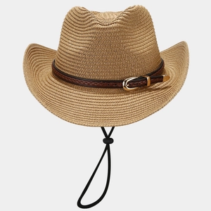 Detail of straw cowboy hat featuring woven leather band and gold metallic buckle
