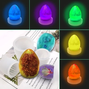 Egg shaped resin silicone mold with LED light base for DIY starry night lamp projects