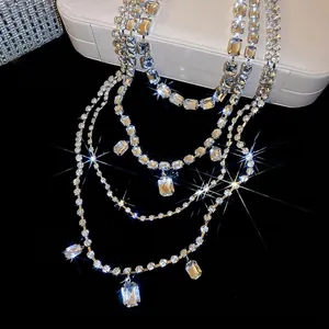 Sparkling multi-layer rhinestone fringe necklace with square-cut cubic zirconia crystals