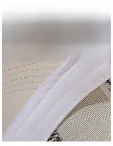 Detail of reinforced sweatband and moisture-wicking fabric on baseball cap interior