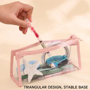 Transparent PVC pencil case with pink trim and stable triangular base for students