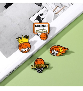 Detail of basketball enamel pins set featuring MVP trophy, basket, and flaming ball designs