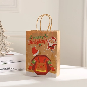 Detailed view of natural kraft paper Christmas gift bag with festive red holiday printing