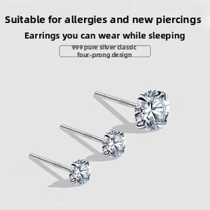 Detailed view of three sizes of S999 sterling silver stud earrings with round zircons