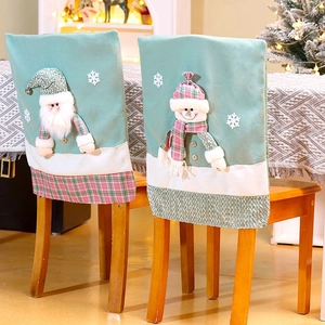 Christmas chair covers featuring 3D Santa and snowman dolls with mint green plaid fabric