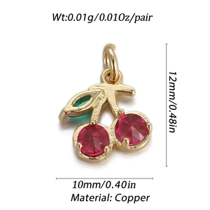 Macro shot of 14k gold-plated cherry pendant with dimensions and weight data