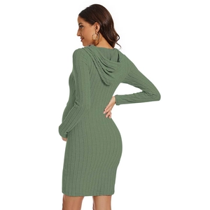 Detail of sage green knitted maternity dress featuring a drawstring hood and slim fit