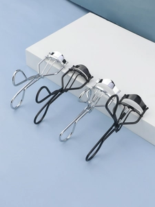 Set of 4 professional stainless steel eyelash curlers in matte black and silver finishes