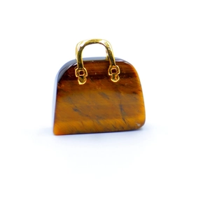 Tiger eye crystal mini handbag pendant with gold handle on white background
