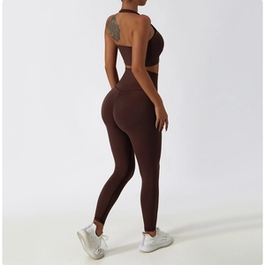 Slim-fit two-piece yoga set featuring cropped tank top and high-waisted brown leggings