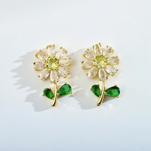 Elegant gold plated flower stud earrings with green and white sparkling gemstones